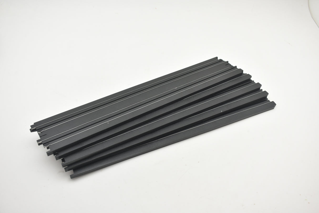 Assortment of black model train tracks, straight pieces for Auto World H0045, alternate track view