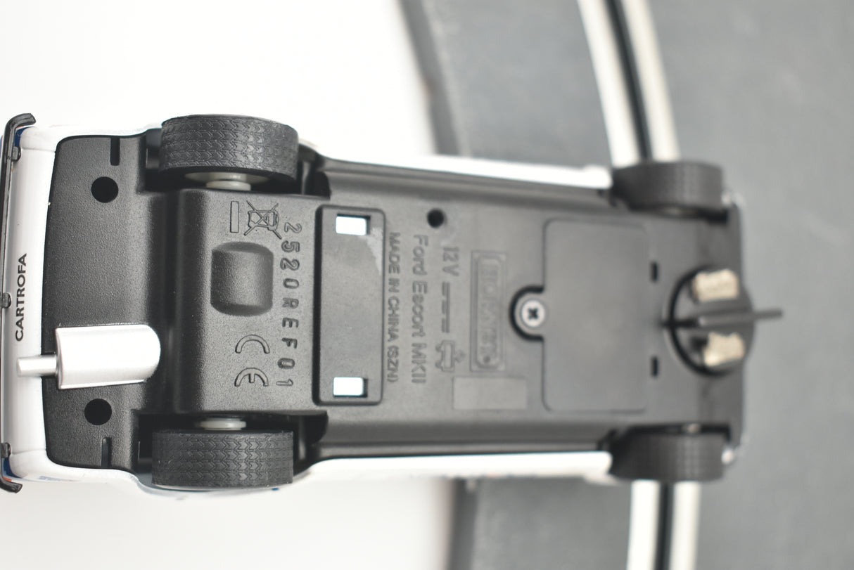 View of a model car's underside showing electrical details for Scalextric C4150