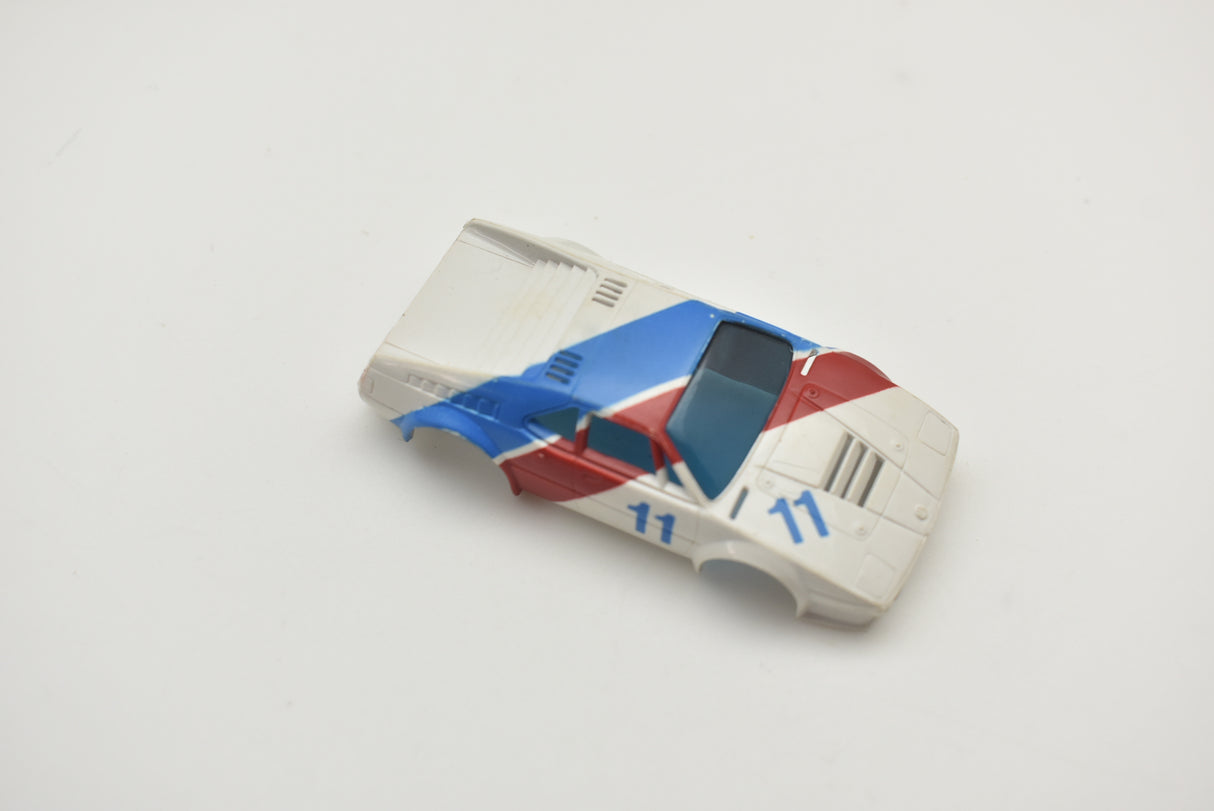 Tomy BMW M1 slot car, red, white, and blue, model #11 for Aurora / AFX / Tomy 11-1957-001