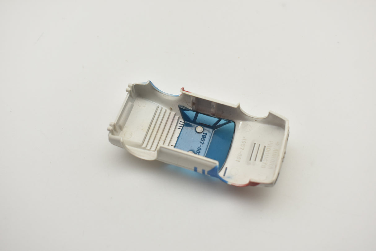 Tomy BMW M1 slot car toy car, red, white, and blue for Aurora / AFX / Tomy 11-1957-001