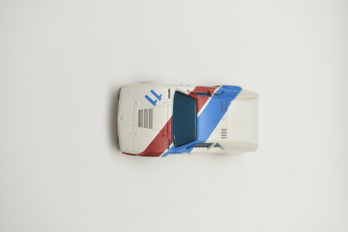 Tomy BMW M1 race car model, red, white, and blue livery for Aurora / AFX / Tomy 11-1957-001