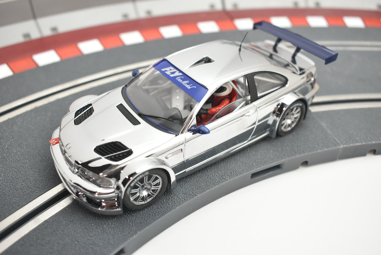 Silver model race car on a track, viewed from the side for Fly Car 88040