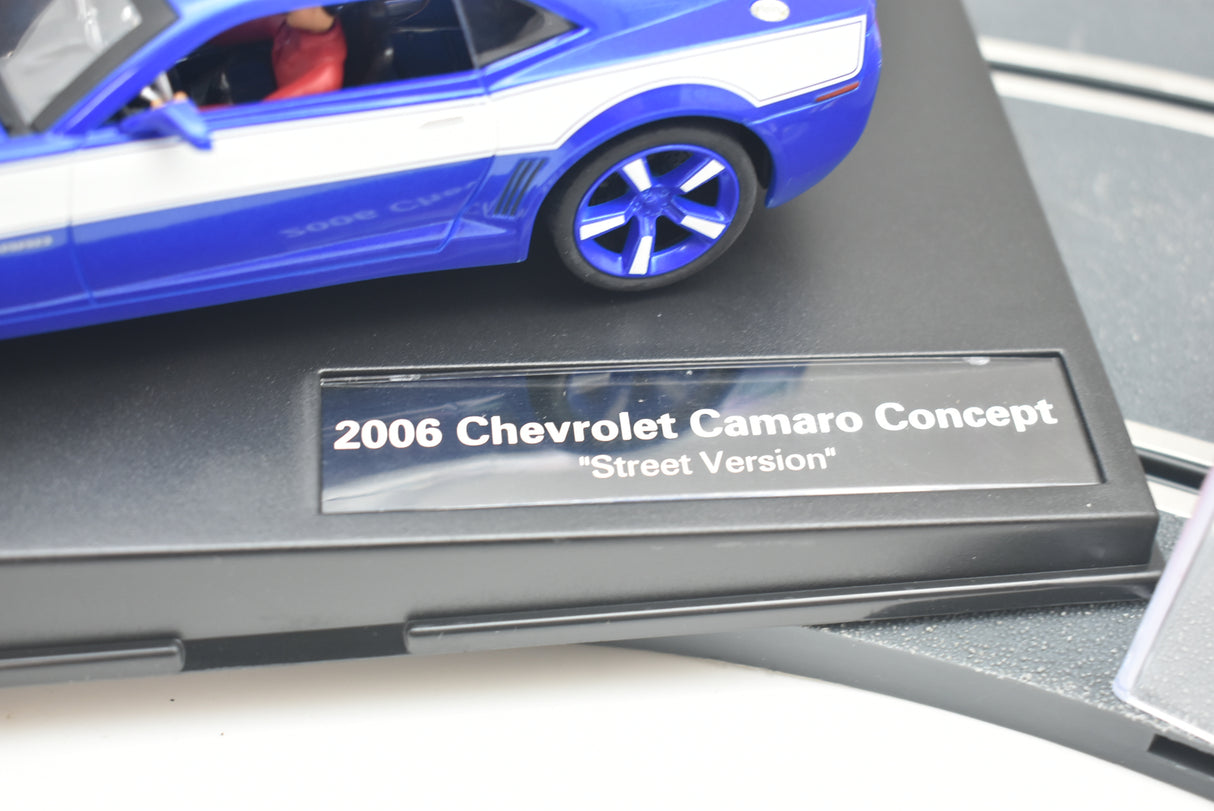 Blue slot car on a plaque reading "2006 Chevrolet Camaro Concept 'Street Version'" for Carrera Evolution 27462