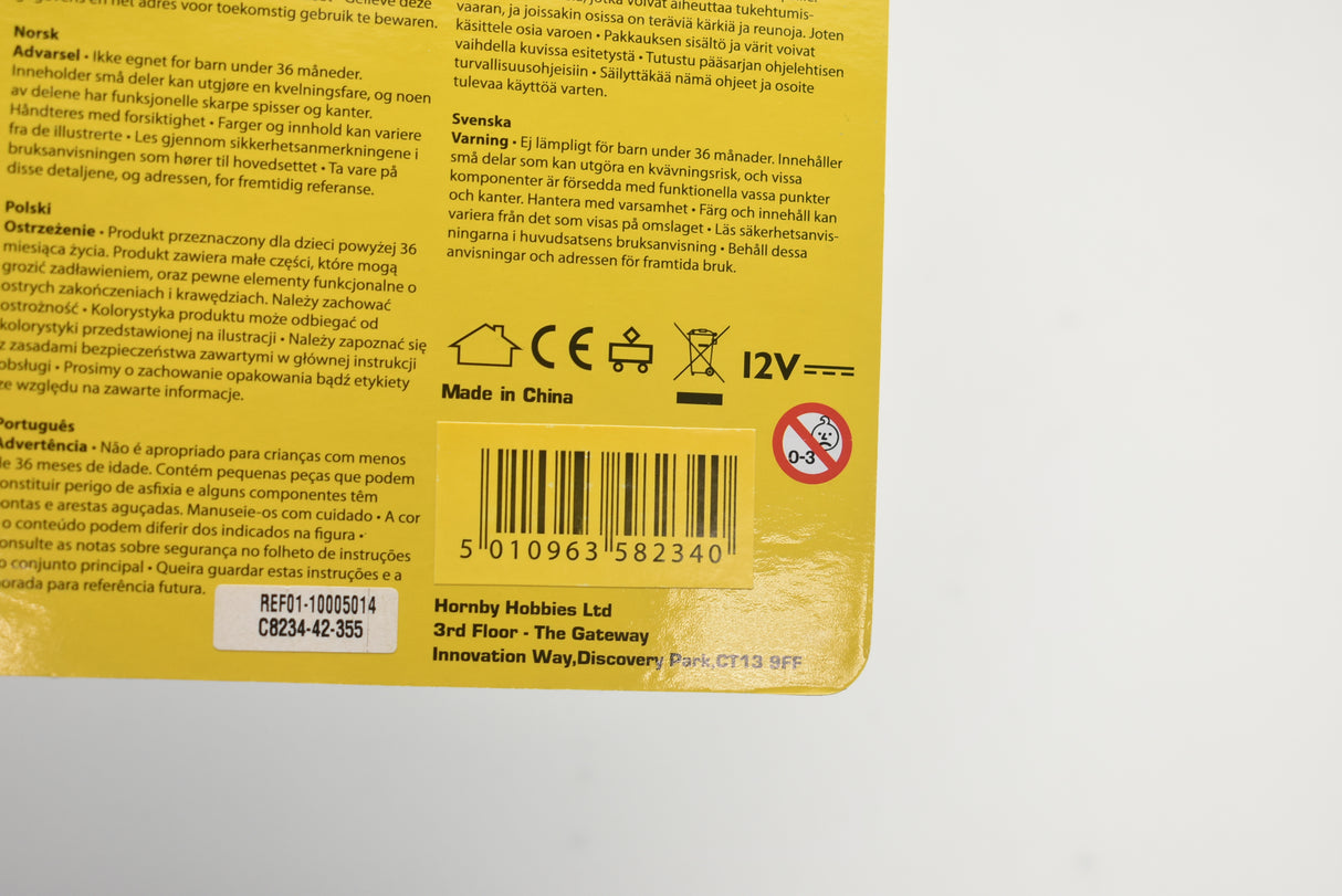 Product packaging showing model car details and safety warnings for Scalextric C8234
