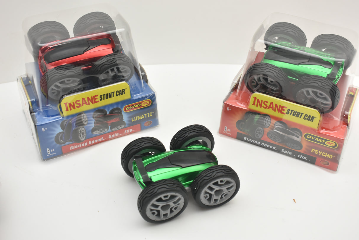 Green and black remote control stunt car on a white surface for 48000 48000