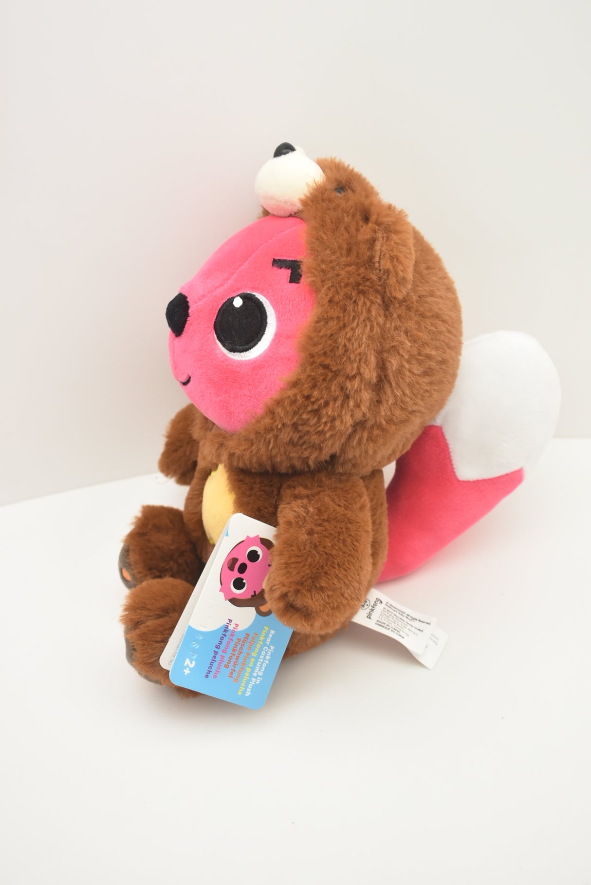 Brown bear plush toy with pink shark tail, ready for cuddles for Pinkfong Plush 61048