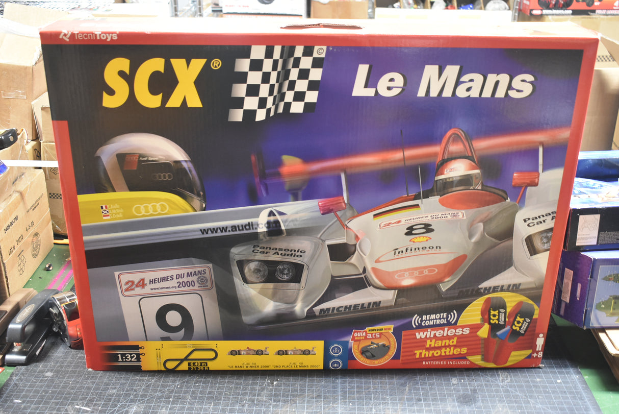 Slot car set box featuring Audi and Porsche race cars for Le Mans racing for SCX 80500