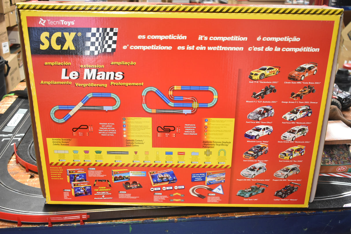 Slot car set box showing track layout and car models for Le Mans racing for SCX 80500