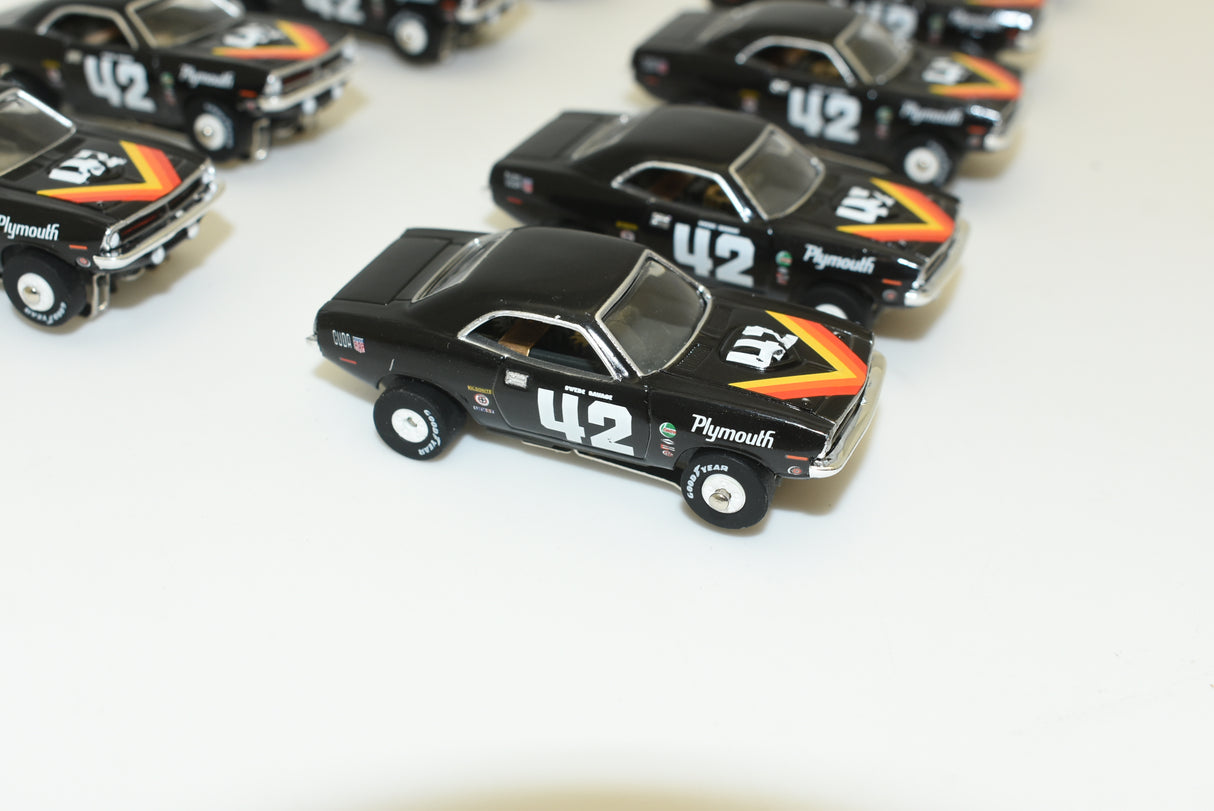 Black 1970 Plymouth 'Cuda slot car with number 42 for Slot Car 1:64 SC338