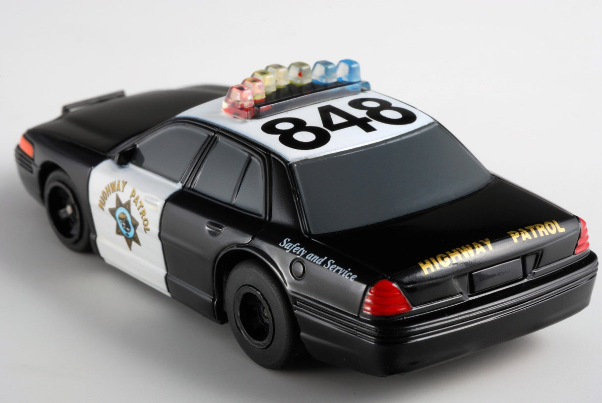 Black toy car replica of a Highway Patrol vehicle with "848" on the roof for AFX/Racemasters 21034 / 21003