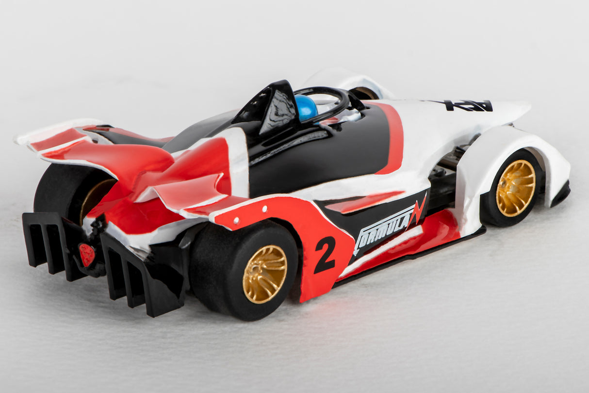 Black, red, and white race car model with gold wheels for AFX/Racemasters 22015, rear view