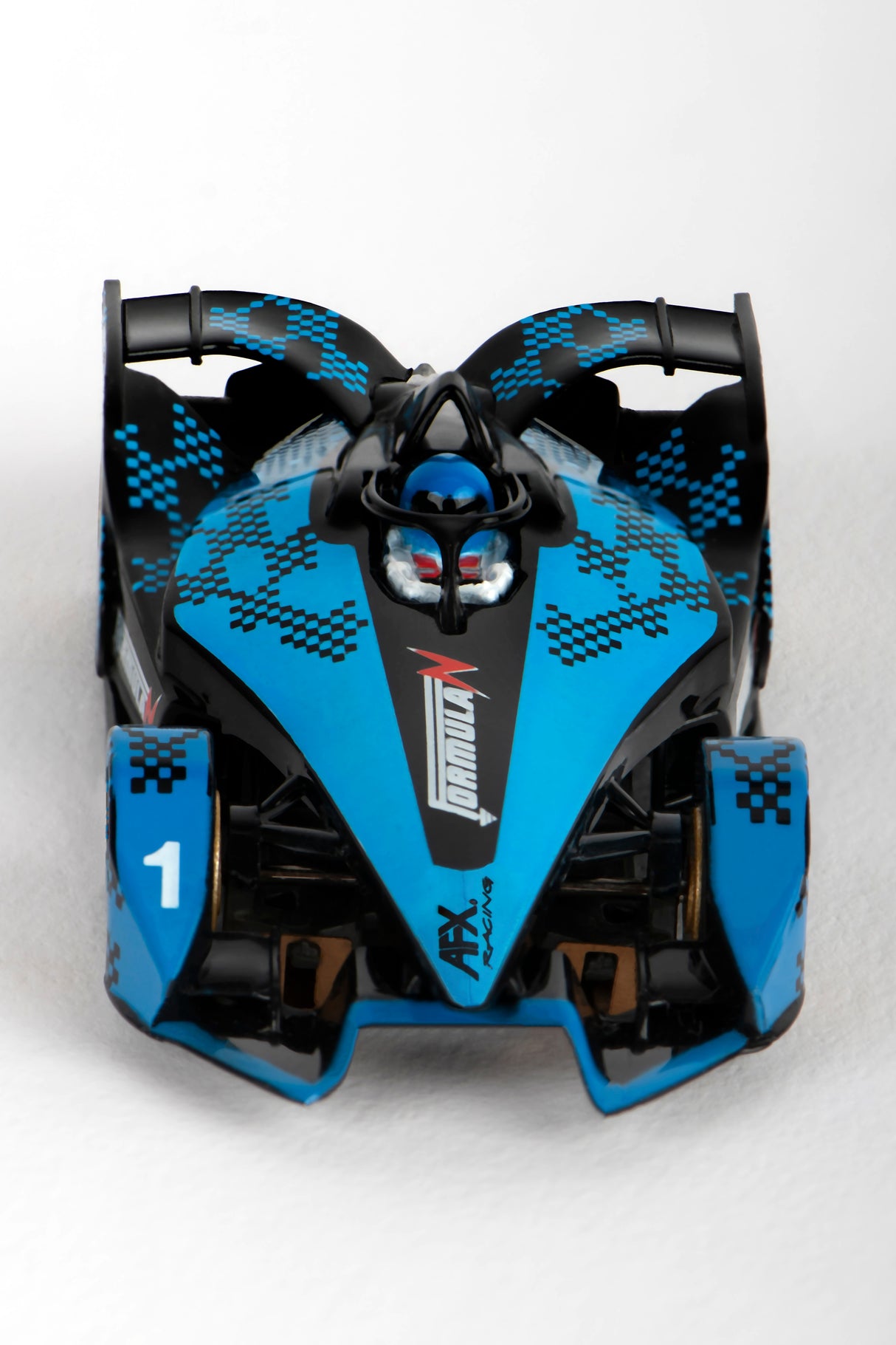 Blue and black race car model with checkered accents for AFX/Racemasters 22039