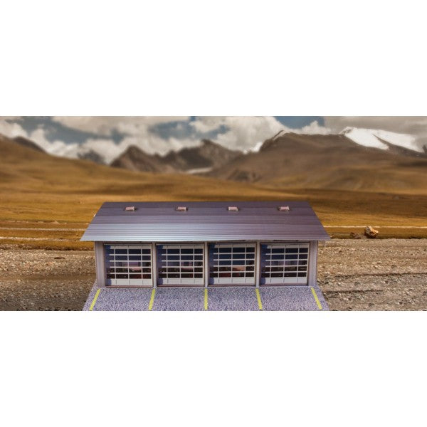 Model kit of a four-stall pit garage with yellow parking lines for Innovative Hobby Supply BK4811