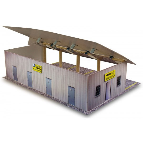 Model kit of a four-stall pit garage with canopy and signage for Innovative Hobby Supply BK4811