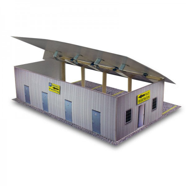 Model kit of a four-stall pit garage with canopy and parking signs for Innovative Hobby Supply BK6411