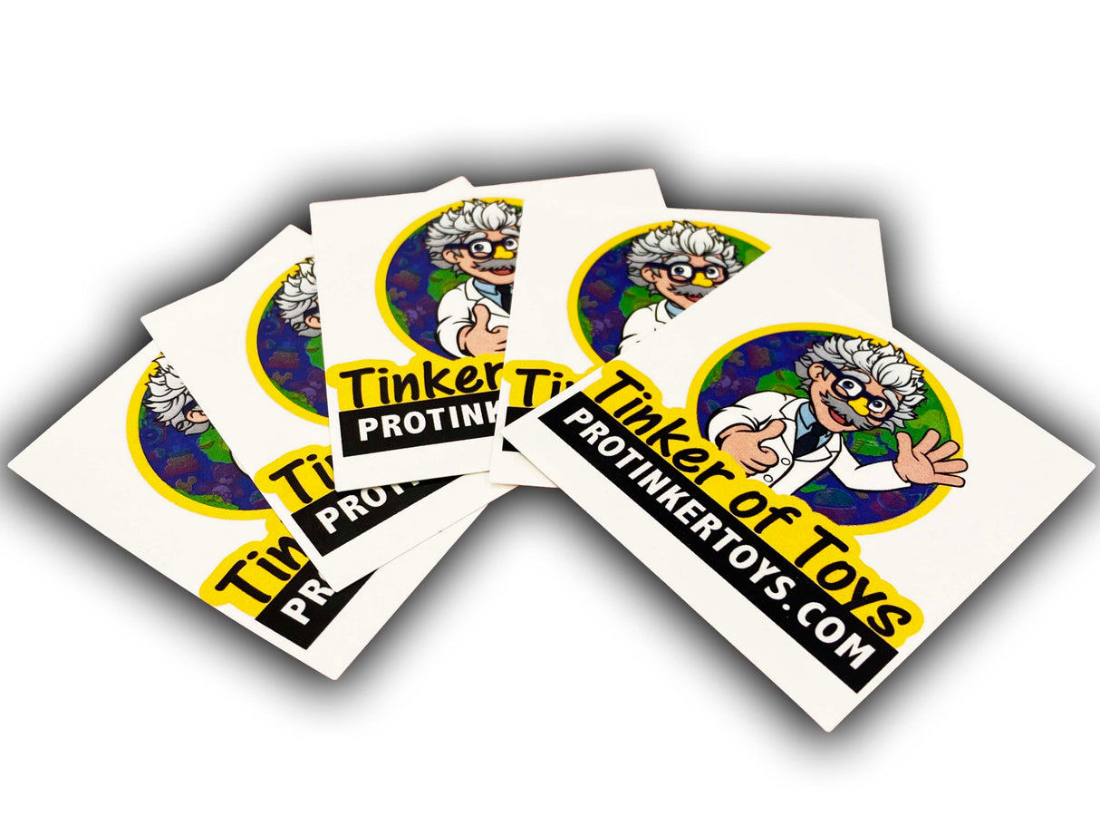 Stickers featuring a cartoon inventor character and website text
