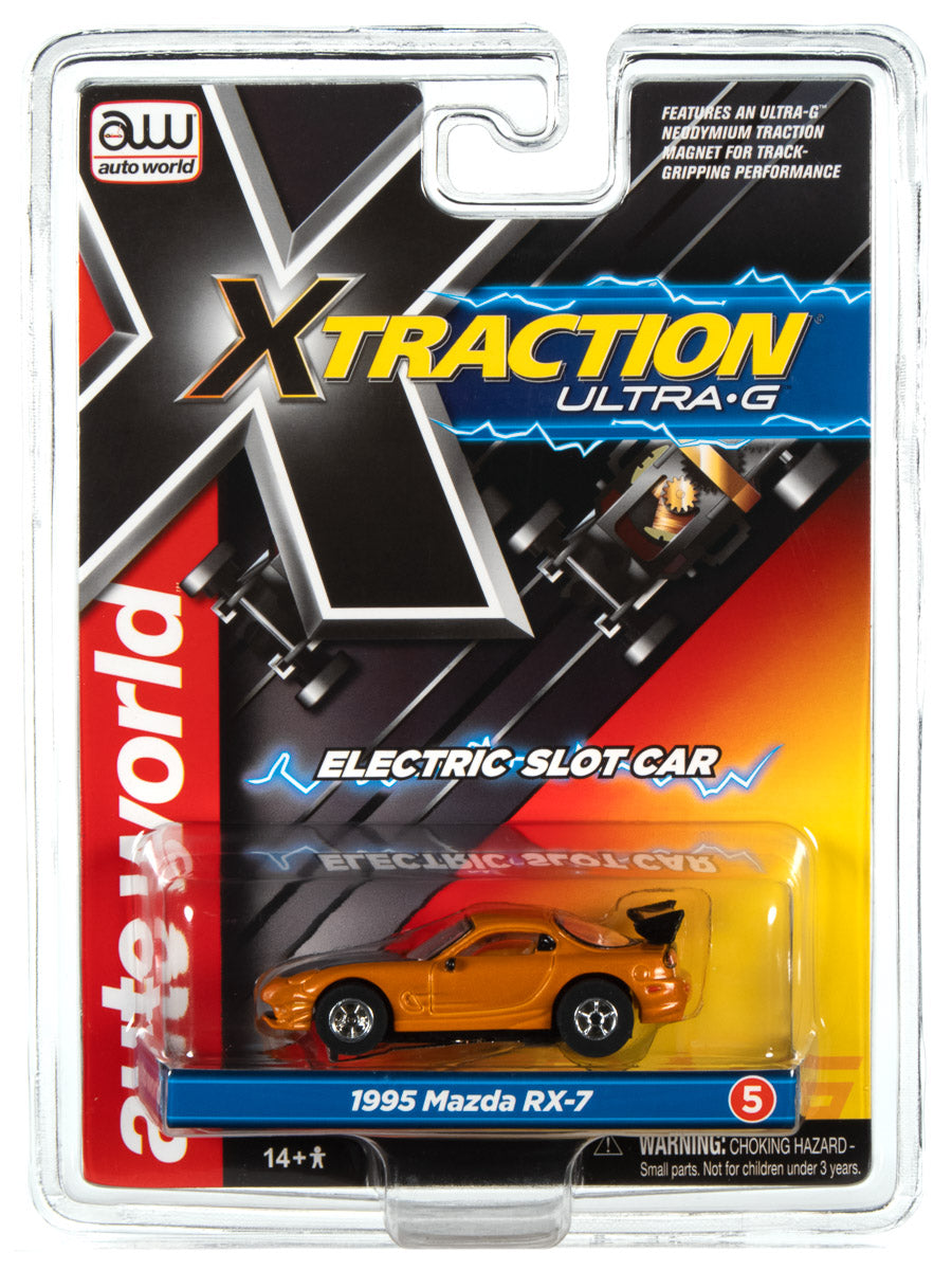 Yellow 1995 Mazda RX-7 electric slot car toy in packaging for Auto World SC368