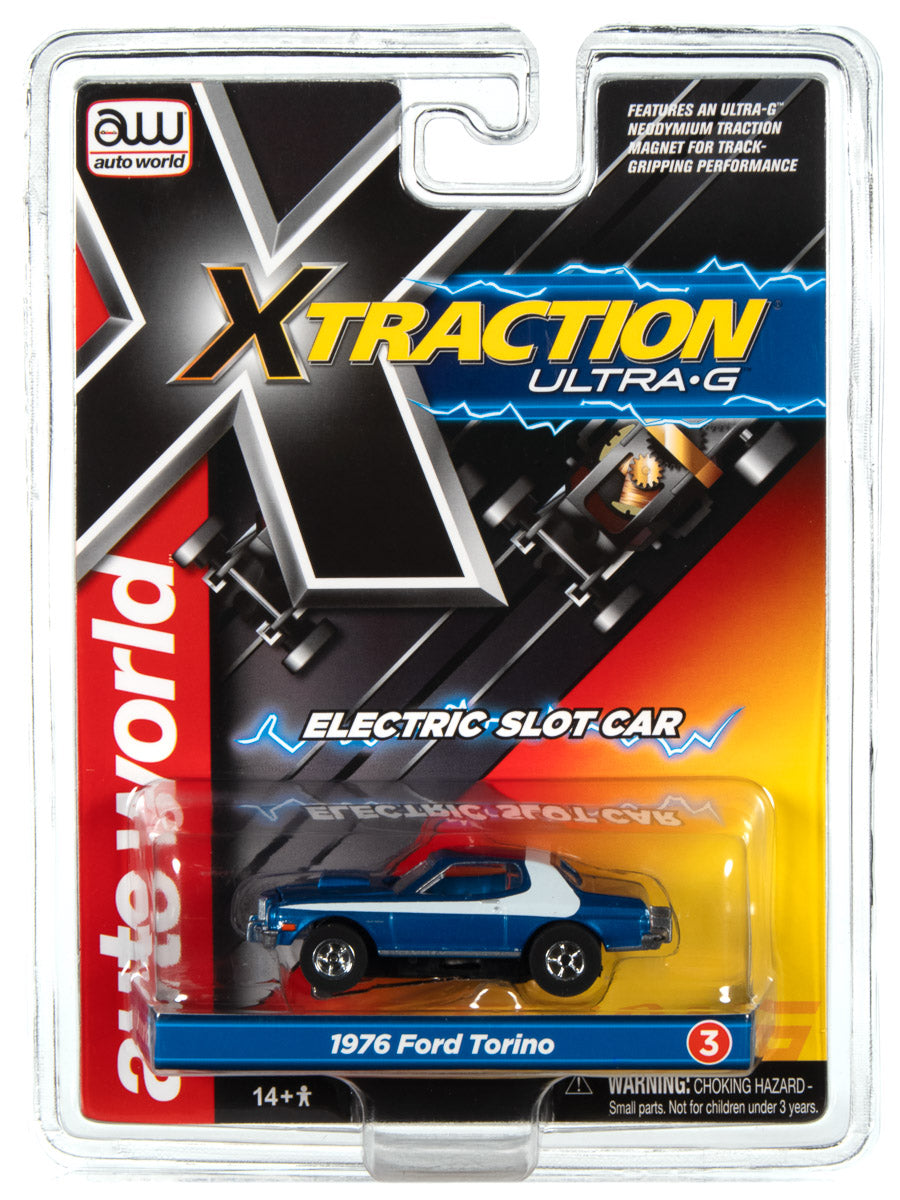 Blue 1976 Ford Torino electric slot car in clear plastic packaging for Auto World SC368