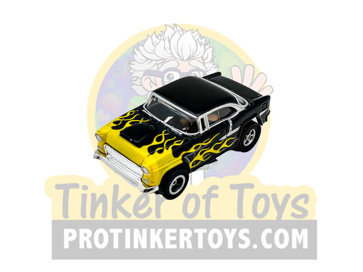 Black and yellow 1955 Chevy Bel Air slot car with flame graphics for Exclusive #2 CP7760PT, front view