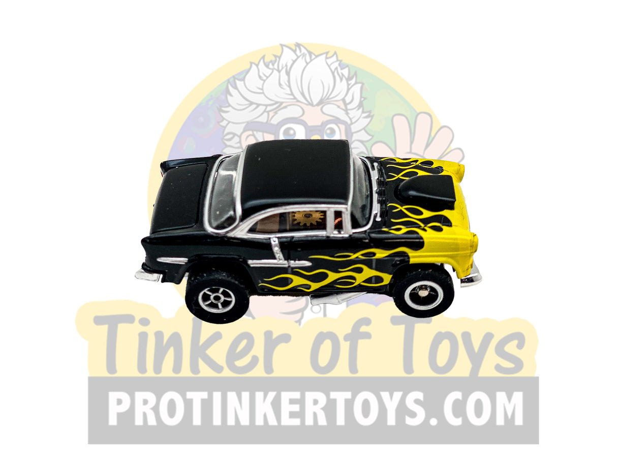 Black and yellow 1955 Chevy Bel Air slot car with flame graphics for Exclusive #2 CP7760PT, rear view