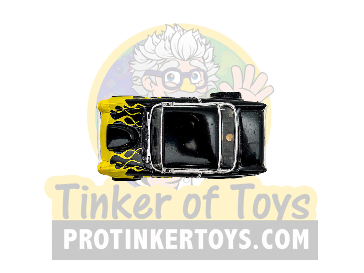 Black and yellow 1955 Chevy Bel Air toy car with flame decals for Exclusive #2 CP7760PT, rear view