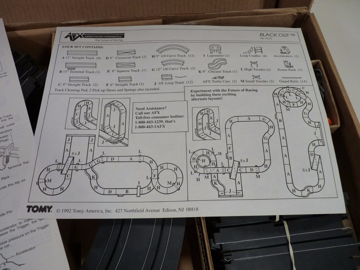 Race track layout diagram showing track pieces and connectors for a toy race set for Aurora / AFX / Tomy 9115M