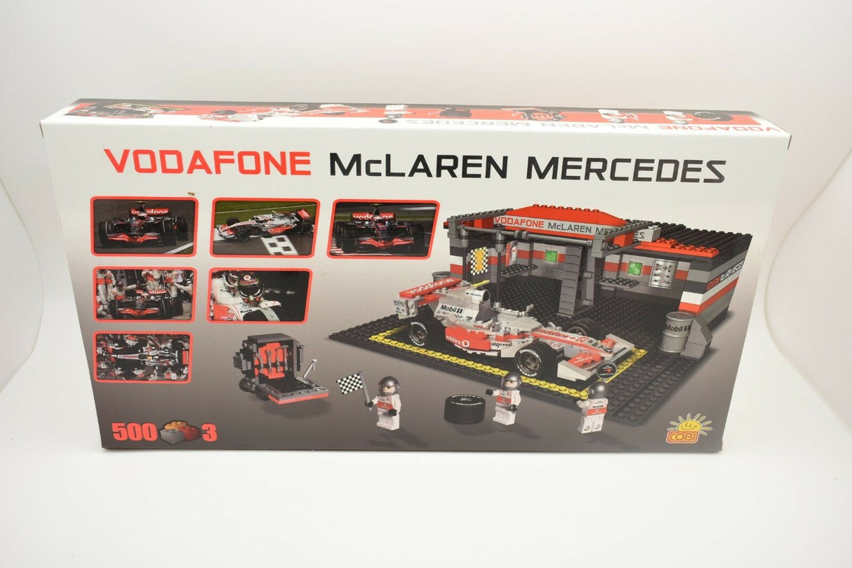 Building set box featuring a McLaren Mercedes race car and pit area for COBI COBI22550
