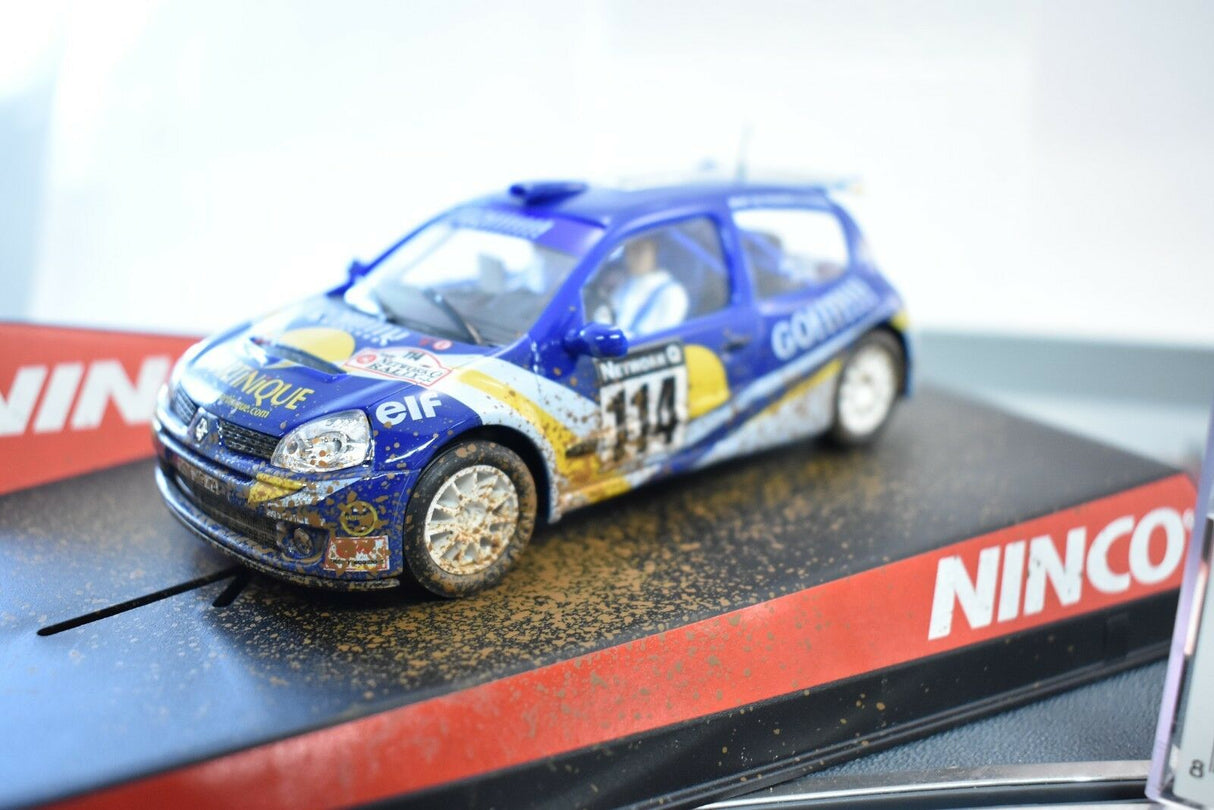 Blue slot car replica on a track base, showing dirt effects for Ninco 50313