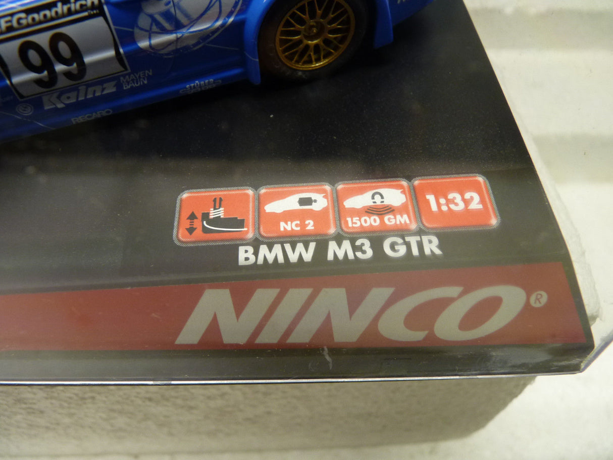 Blue BMW M3 GTR model car box showing scale and weight specs for Ninco 50279