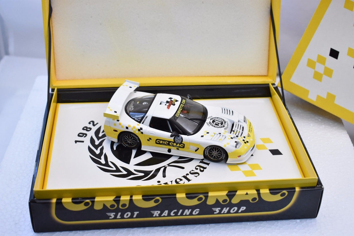 Yellow and white Corvette model car in its open display box for Fly Car E123