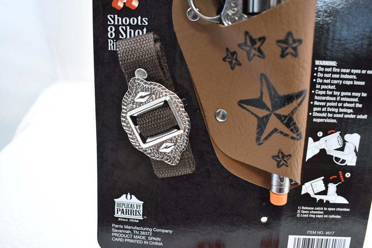 Revolver and holster with product details and safety warnings for Parris Toys 4617
