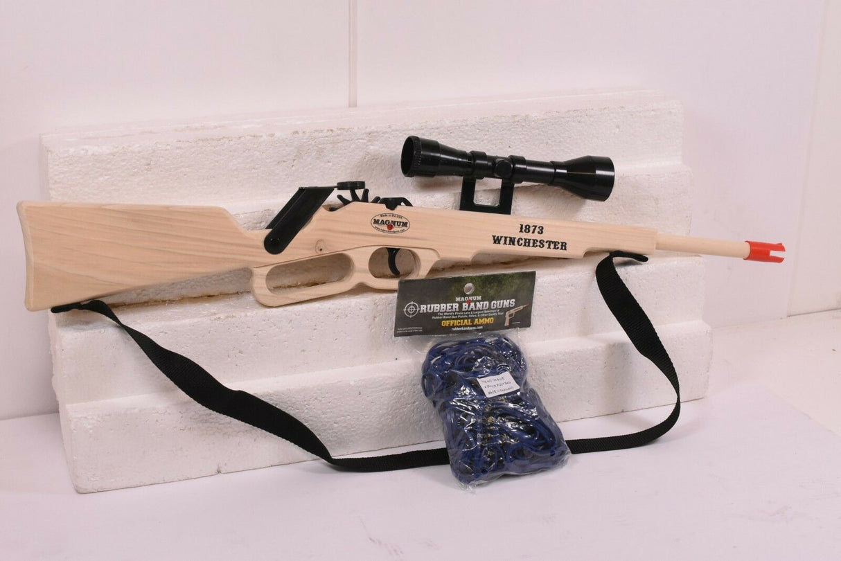 Wooden rifle with scope, sling, and bag of blue rubber bands for Magnum Rubber Band Guns GL21873SSS