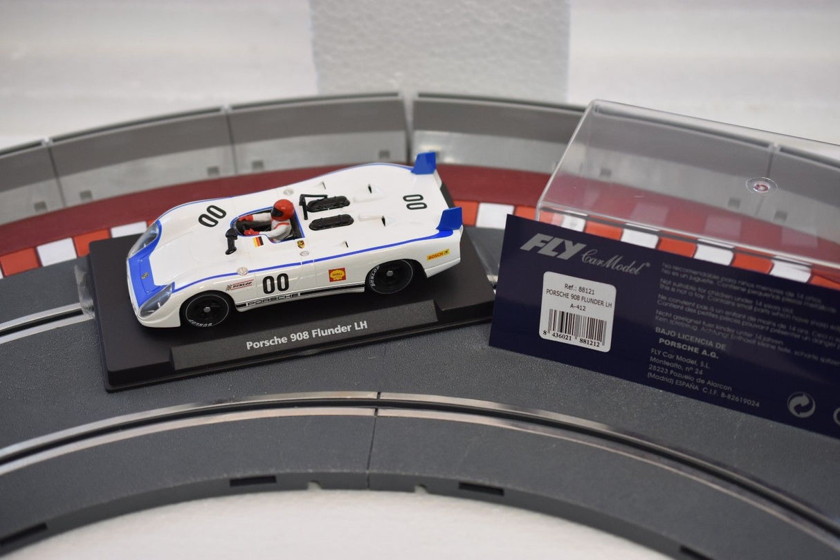 White and blue slot car of a Porsche 908 Flunder LH for Fly Car 88121
