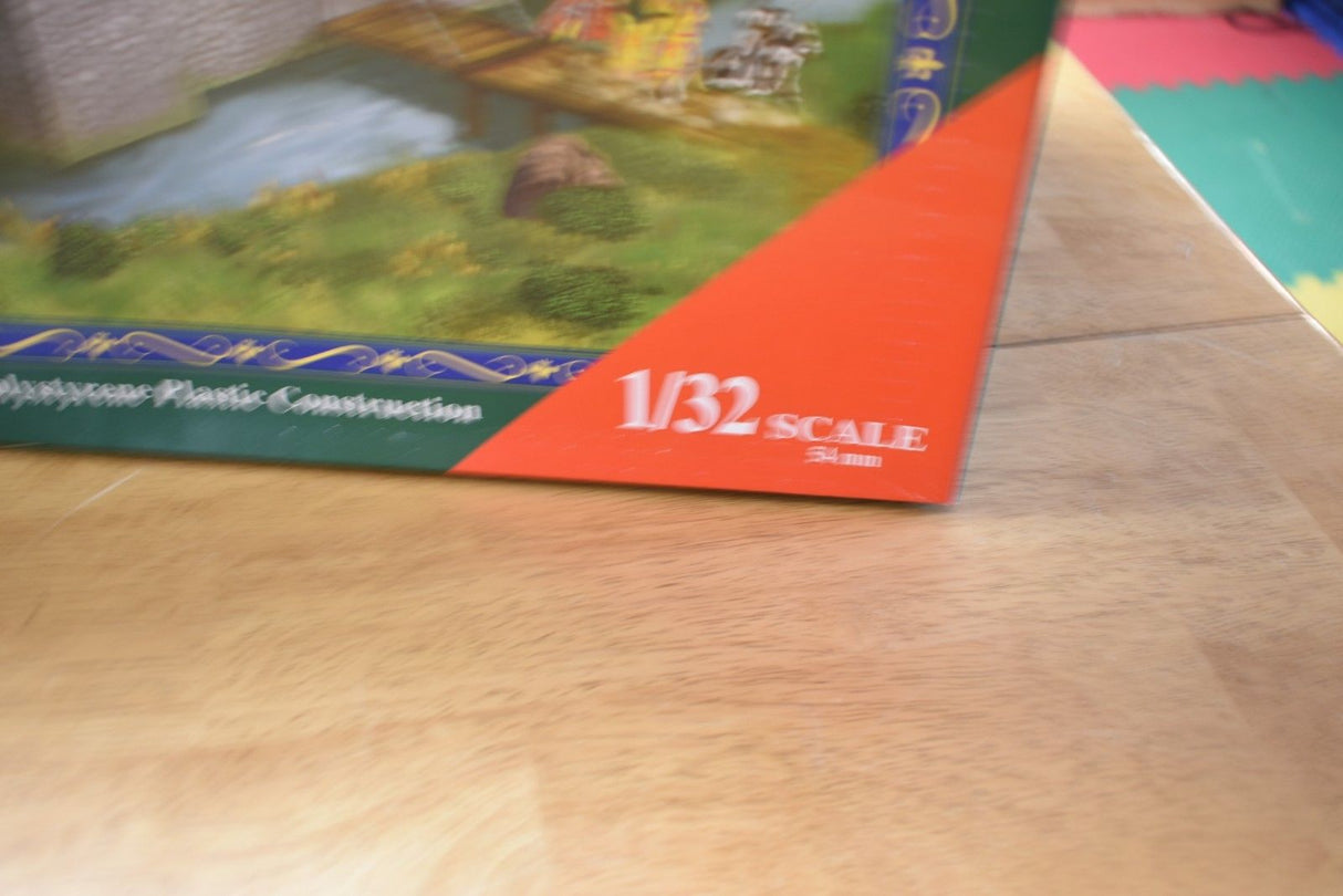 Model kit box showing a castle scene, marked 1/32 scale for IMEX IMX3281