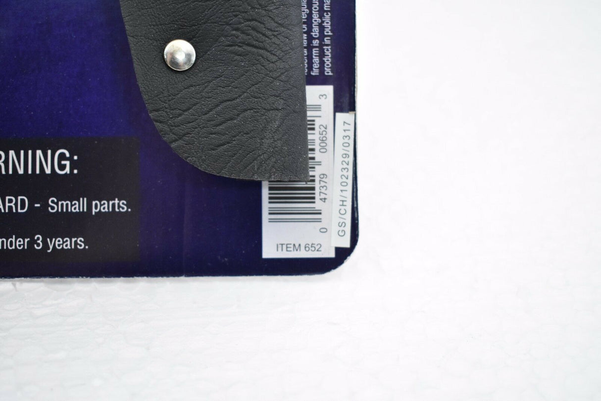 Product packaging showing a revolver and holster with safety warnings for Parris Toys 0652