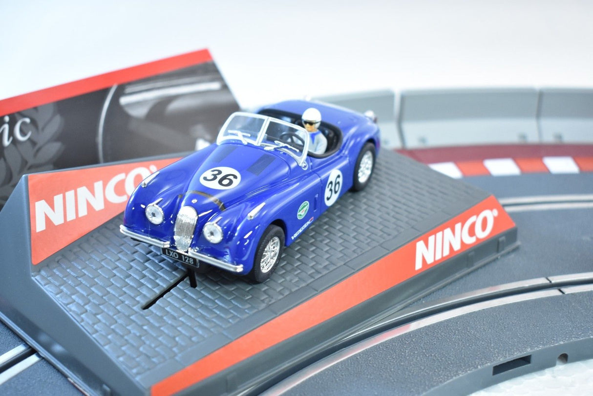 Blue 1/32 scale race car on a track section for ZZ Expired Kim Collection 50520