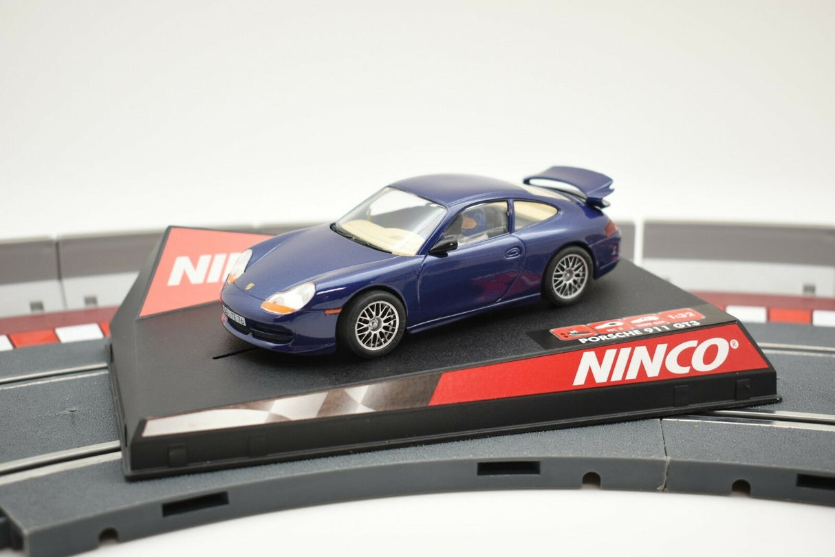 Blue Porsche GT3 race car on a track section for NINCO 50234