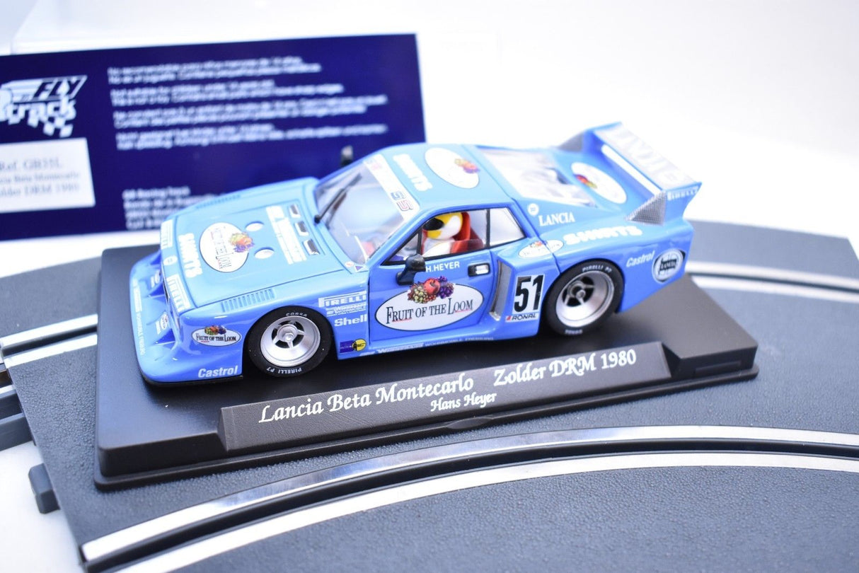 Blue Lancia Beta Montecarlo race car model on display stand for Fly Car GB35L