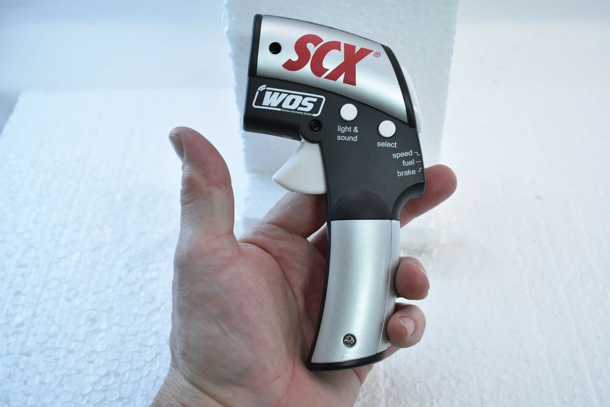 Handheld throttle control with red and black accents for SCX WOS W101206X3U0