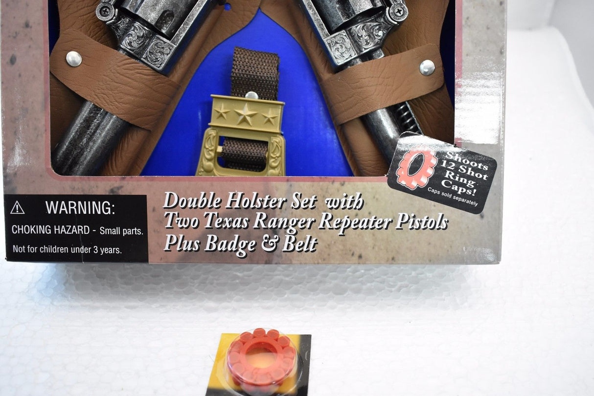 Toy holster set with two Texas Ranger pistols, belt, and badge for Parris Toys 4618