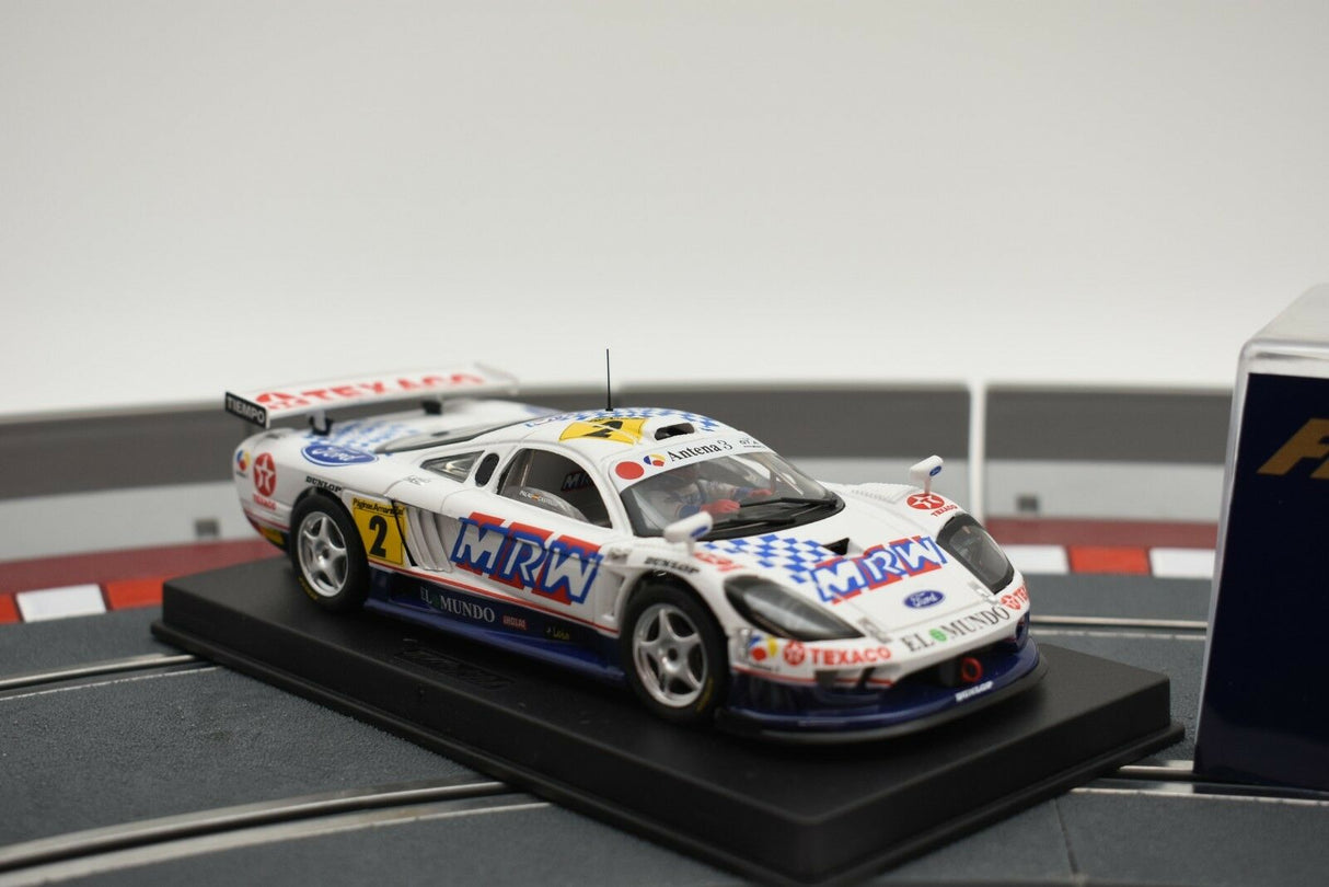 Scale model of a white and blue race car on a display stand for Fly Car 88020