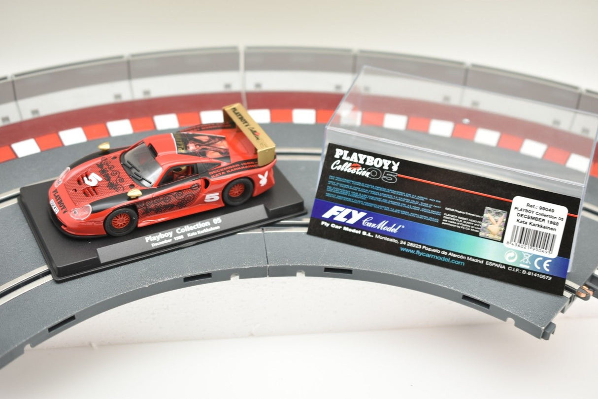 Red race car on a track section with product information card for Fly Car 99049