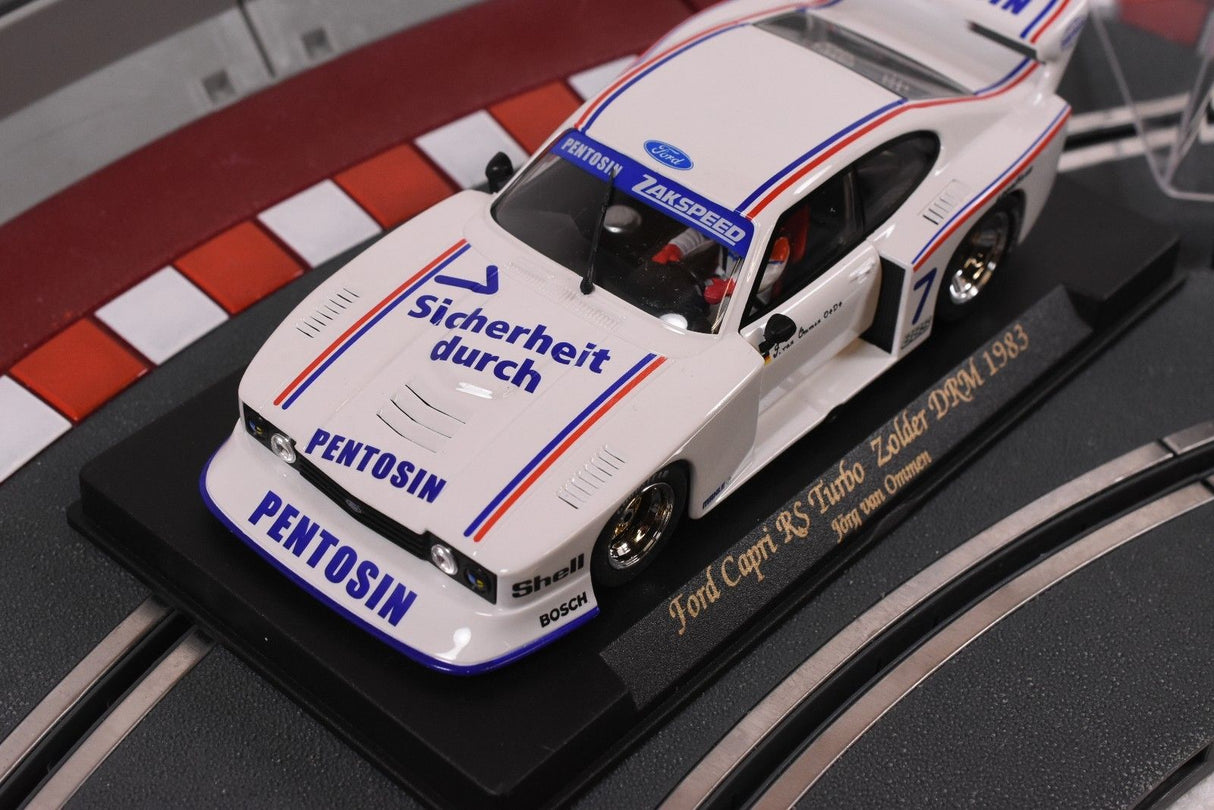 White model car of a 1983 Ford Capri RS Turbo on a display base for Fly Car 88027, front view