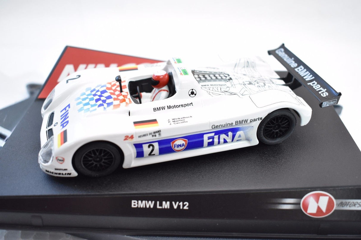 White race car model with "Fina" branding on a black base for Ninco 50193