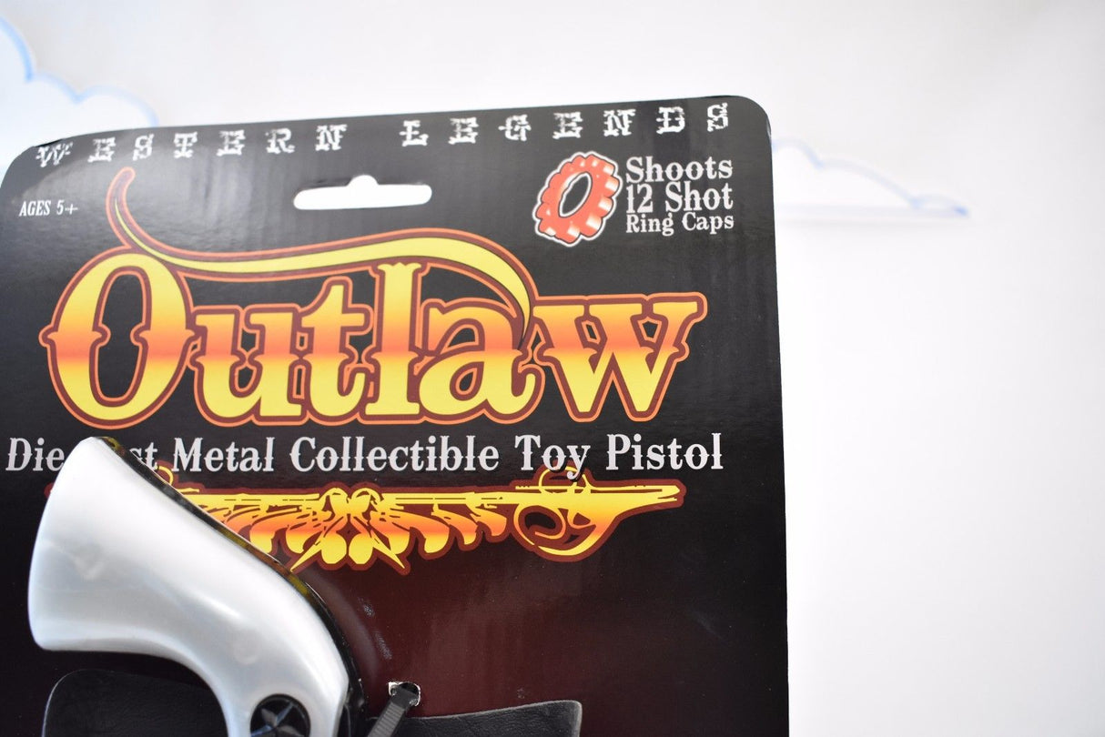 Toy pistol packaging featuring "Outlaw Western Legends" branding for Parris Toys 4708B