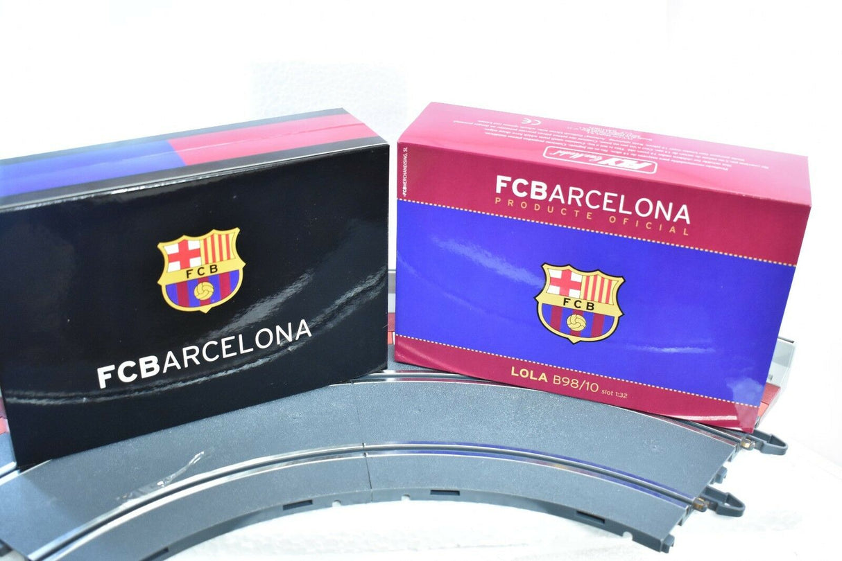 Two FC Barcelona collectible boxes displayed on a curved surface for Fly Car 96013