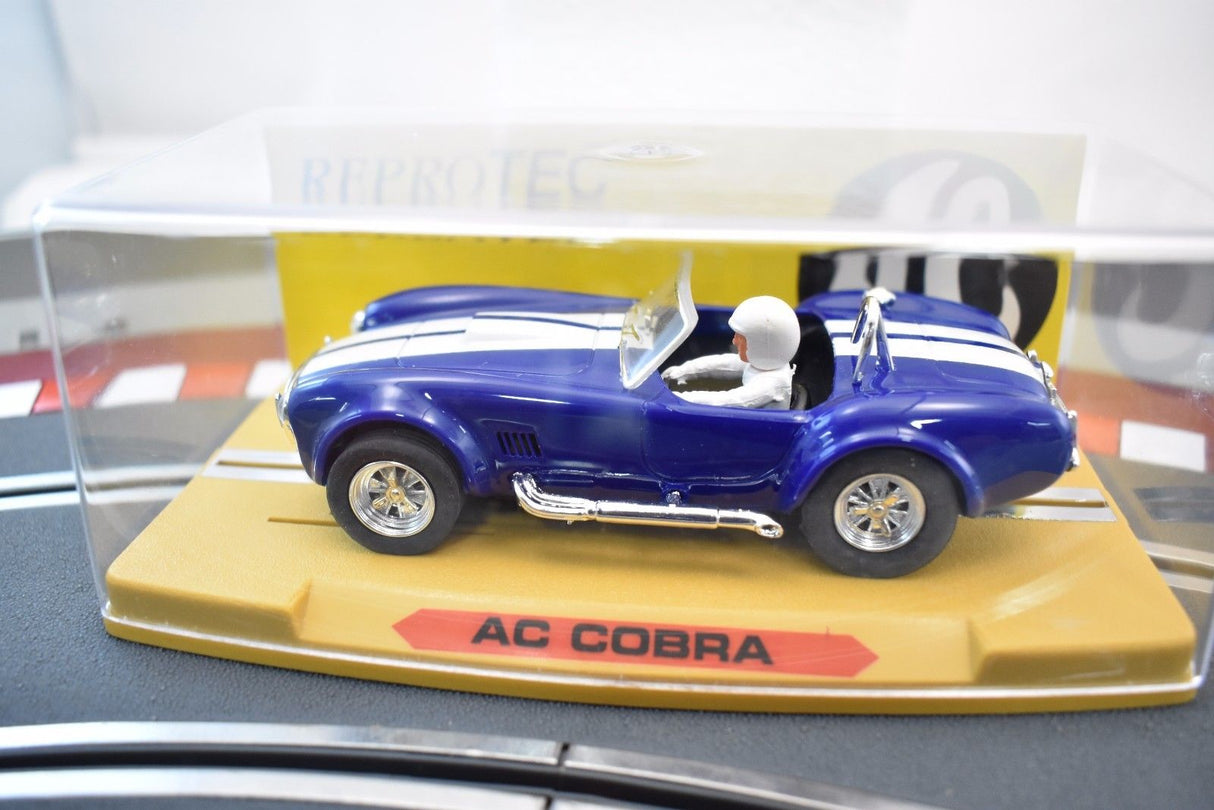 Blue AC Cobra model car on a display base for REPROTEC RT/1962