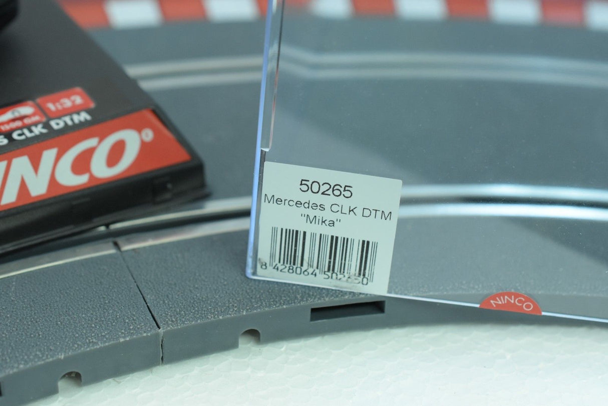 Product label showing 50265 Mercedes CLK DTM "Milka" slot car for REH Ninco