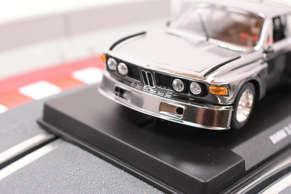 Silver slot car on a black display base for Fly Car 88124