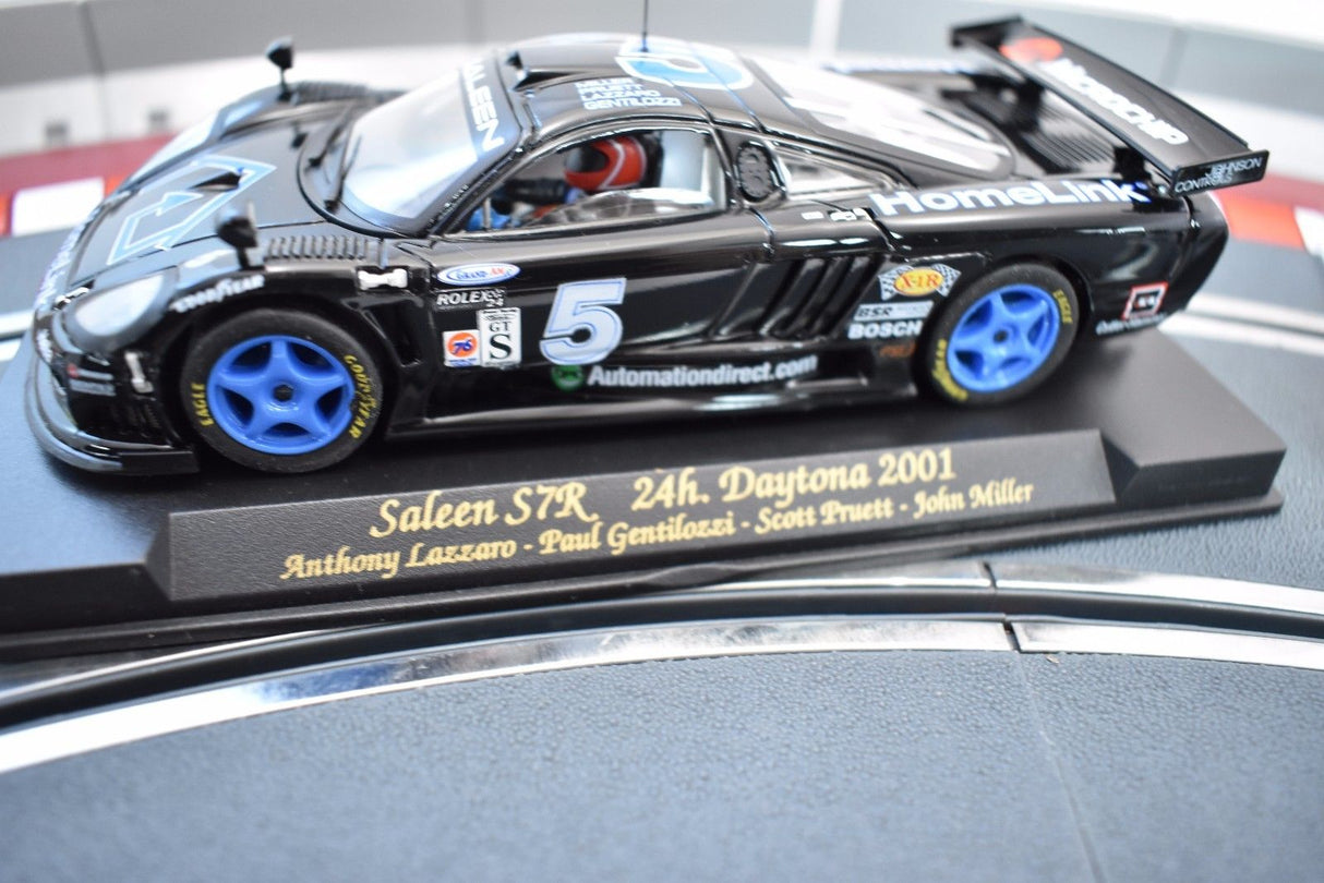 Slot car of a 2001 Saleen S7R race car on a display base for Fly Car 88015, rear view